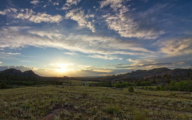 Open grassland and a wide sky at Vedauwoo, Wyoming